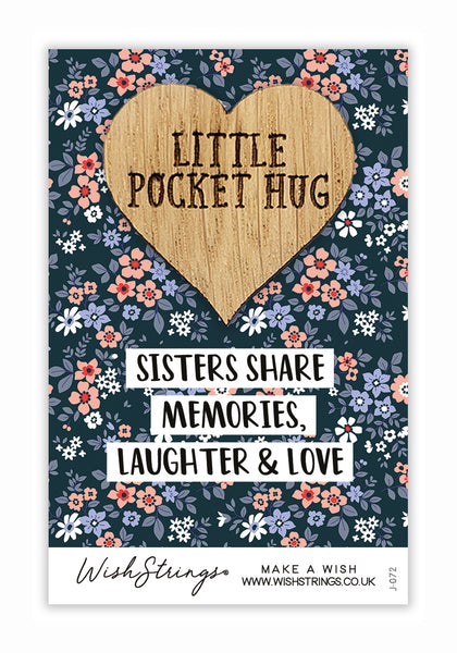 Sisters Share Little Pocket Hug
